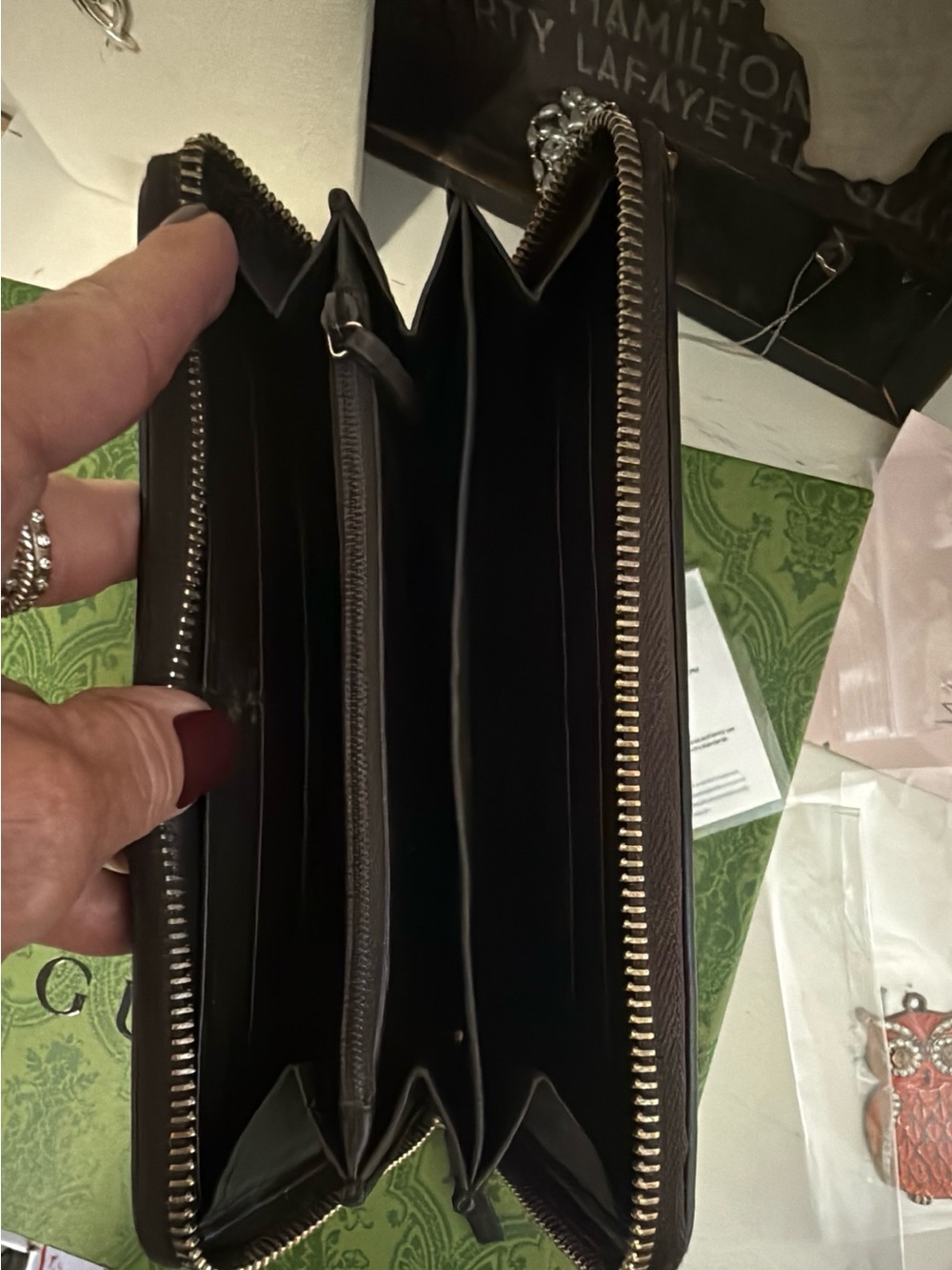 Gucci Guccissima zip-around wallet features signature embossed monogram leather - Picture 14 of 14